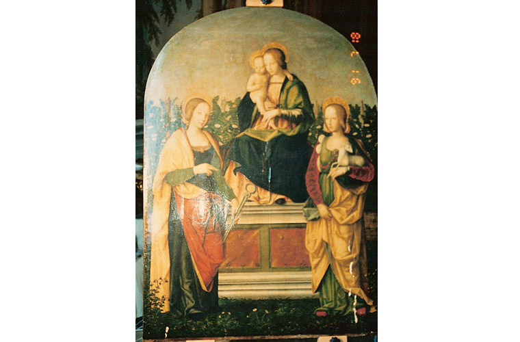 "Saints Agatha and Agnes with Madonna and Child" before cleaning. 15th century, wooden altarpiece. Note paint loss, lower right.<br />Galleria Colonna, Rome, Italy.