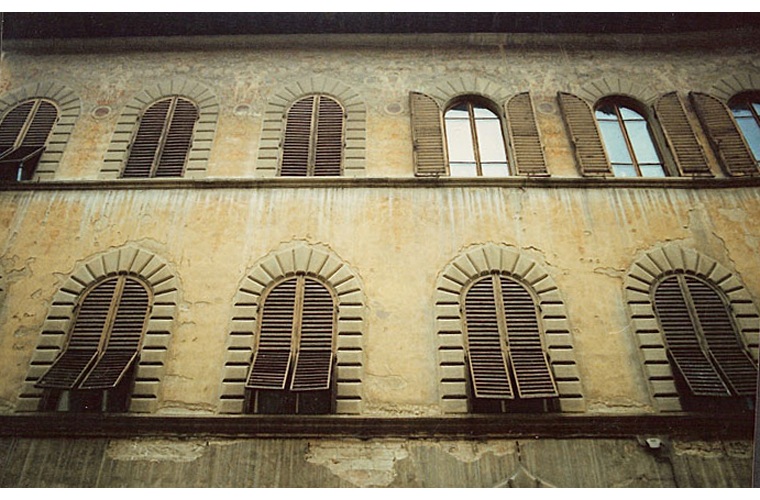 Before: the barely legible condition of the painted fa&ccedil;ade by Galileo Chini (1904-05), 15th century building.<br />Via Cavour 18-24, Arezzo, Italy.
